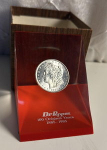 Dr. Pepper 100 Original Years Commemorative 1885 Morgan Silver Dollar Paperweight