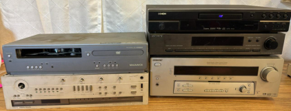 Assorted Home Radio Receivers & DVD Players (1) Sony STR-K850P Receiver (1) Magnavox VCR DVD Combo (1) Harman/Kardon Receiver For Parts (1) Sony ST-JX431 Tuner (1) Denon DVD-1740