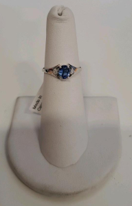 0.85ct. Oval Cut And Faceted Sapphire And 0.04ct. Diamond 10k White Gold Ladies Ring Size 6