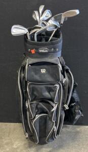 (1) Wilson Cart Bag With Various Clubs Including Wilson, Intregra Proffesional Gold, And More