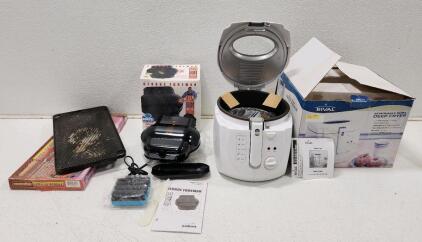 (1) George Foreman Lean Mean Fat Reducing Grilling Machine (1) Rival CZF530 3L Cool Touch Deep Fryer (1) Reversible Grill 'N Griddle