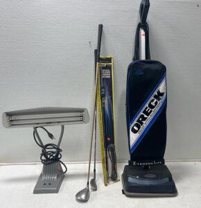 (1) Philips Lamp (1) Oreck vacuum (1) Wilson electrics cellular trucker antenna (2) Golf clubs.