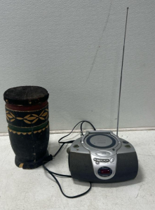 (1) Compact Disc player AM/FM Radio Receiver (1) African Hand drum.