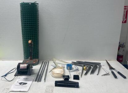 (1) Roll of green plastic-coated wire fencing (1) Hole punch (1) Hedge Shears and more