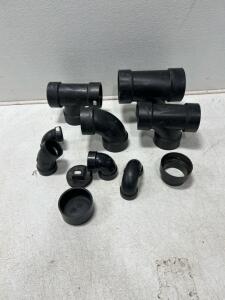 Box of ABS DWV 45-degree hub x hub elbow fitting and ABS DWV Double Sanitary Tee And more