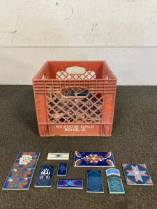 Crate Of Blue, White And Pink Mixture Ceramic Tiles And Black And Decker Saw Without Blade (Unable To Test), Driveshaft Shift Yolk, And Clothes Drying Rack