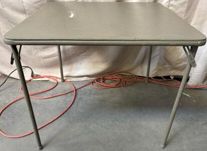 Grey Folding Table H 2&rsquo; 4&rdquo; W 2&rsquo; 9.5&rdquo; L 2&rsquo; 9.5&rdquo;