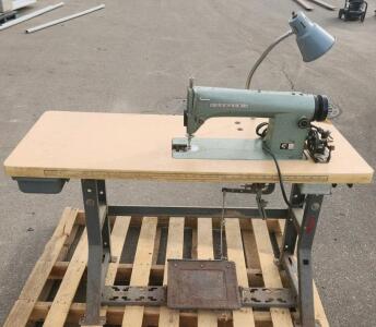 CONSEW 105 Industrial Sewing Machine with STK-M2 Motor and Table.HAS POWER DOESNT MOVE