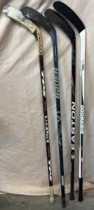 (4) Hockey Sticks