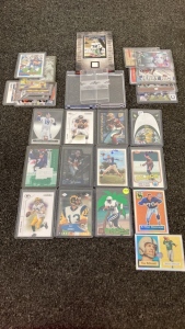 Assorted Sports Cards With Sleeves And Cases