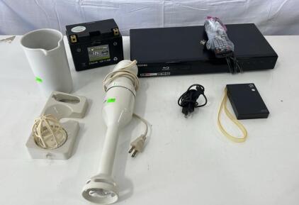(1) Polaroid Mint Instant Print Digital Camera (1) Samsung BD-P1580 Blu-ray Disc Player (1) Braun Immersion Hand Blender & More