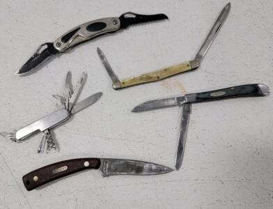 (1) Buck 311 USA Slimline Trapper Knife Black (1) Vintage Schrade Mother of Pearl Folding Pocket Knife (1) Vintage Schrade 154OT Old Timer, Fixed Blade (1)Unbranded Multi-tool Pocket Knife (1) Unbranded 2-Blade Pocket Knife