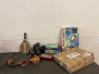 Roller Blades, (3) Baseball Mitts, Racquetball Racquet, Games, Puzzles, Poker Chips. (2) Toy Race Tracks