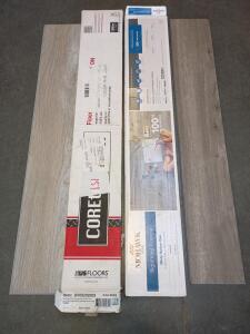 1 Box of Misty Harbor Oak Grey Rigid Vinyl Flooring (7 Planks - 7 1/2"x48"), 1 Box of Nicola Oak Grey Rigid Vinyl Flooring (12 Planks - 7 1/2"x48")