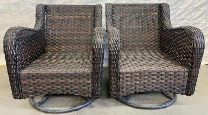 (2) Outdoor Swaying Wicker Chairs H 2&rsquo; 9&rdquo; W 2&rsquo; 4&rdquo; L 2&rsquo; 4&rdquo;