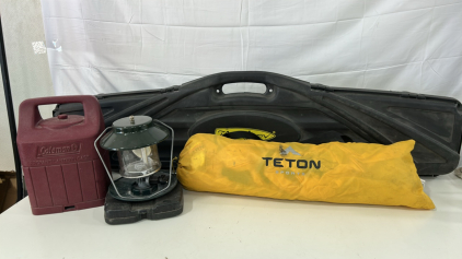 (1) 1927 A1 Thompson Kahr Gun Case (1) Teton Sports Outfitter XXL Quick Tent (1) Coleman Propane Lantern