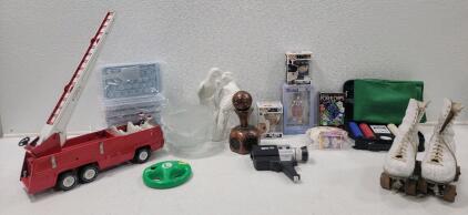 (1) Vintage Tonka Aerial Ladder Fire Truck 32202 Working Ladders (1) Vintage Betty Lytle Styled by Hyde Roller Skates (1) Vintage EMDEKO Super 8 Movie Camera Model EM 8000 UNTESTED (1) Leather Wrapped Decanter (3) 3 Ice Cube Tray Set with Lid, Bin & Scoo