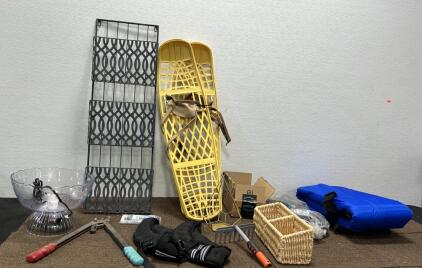 Pair of vintage Victor brand plastic snowshoes with leather bindings,Metal rack for magazines ,Irrigation pipe fittings ,(3) New Boxes of Ski Covers ,(1) Deluxe Party Fountain Turns on ,Unable to tested,20Pound Work out Vest..& More