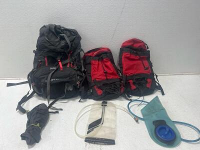 (2) Lucky Bums backpacks (1) Tangent Hiking backpack (2) water Pouches.