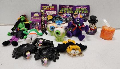 (2) Light Up Eerie Eyes (1) Halloween Voice Changer (1) Light Up Halloween Pendant And Assorted Halloween Toys And Decor