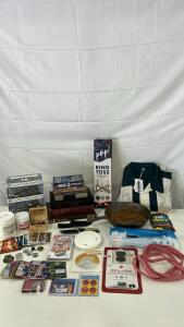 (1) 10&rdquo; Cast Iron Pan (5) Various Books (1) Ozark Trail Knife & More