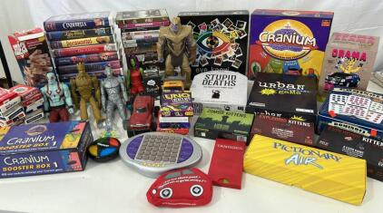 (20+) Board/Card Games Including Uno And Cranium (7) Action Figure Toys Including Thanos (16) VHS Tapes Including Cinderella And Pinocchio