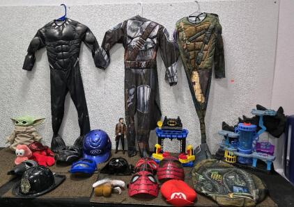 Tote With Toys ,Super Heroes Suits, & More .