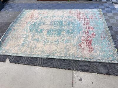 (1) 7'10"X10'10" Oriental Weavers Area Rug