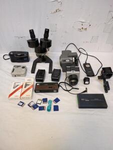 Microscope, Kodak Trimlite Instamatic Camera, Vivitar EZ200 Camera, Argus DC3000 Internet Digital Camera And a Lot of Accessories W A Hard Shell Travel Case