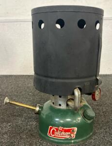 (1) Coleman 502 Sportster Stove With A Heat Drum