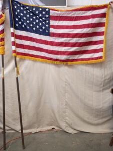 American Flag with a Gold Fringe and a Wooden Pole. This Type of Flag is Often Used for Display in Offices, Ceremonies, or Classrooms or Mounted on The Side Of a House