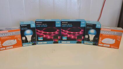 (2) Merkury Smart WiFi Led Strips (2) Merkury Smart WiFi Light Bulbs and (2) Sylvania Smart Led Stripe