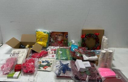 (1) Tote with Christmas decorations including Cookie Cutter Sets, A Christmas tree topper, and more.