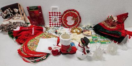 (1) Santa Boot Planter (1) Vintage Ceramic Snowman Holding Candy Cane (1) Vintage Lighted Angel Christmas Tree Topper And More