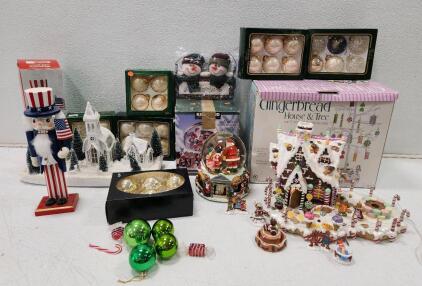 (1) Costco Gingerbread House (1) Avon Snowy Greetings Hanging Sign (1) Kirkland Signature Musical Waterglobe With Revolving Base And More