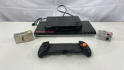 (1) Samsung Blu-ray Disc Player (1) LG DN898 DVD Player (1) DOBE TNS-1125 Handheld Controller Grip For The Nintendo Switch & More