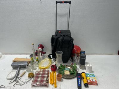 (1) Bowling bag with the Incredibles bowling ball. (1) tote with 2 flashlights, Salt and pepper shakers, and more.