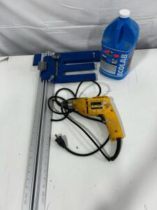 (1) Kreg Rip-Cut Cutting Guide (1) DEWALT DW106 Variable Speed Reversible Grip Corded Drill (1) Ecolab Exterior House And Siding Pressure Wash Concentrate 1 Gallon