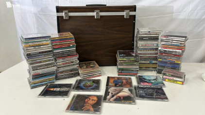 (1) Brown Trunk Box (130) CDs Including Aerosmith, Disturbed And Toby Keith