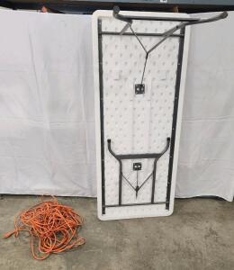 (1) 29"H X 29 3/4"W X 71 1/2"L Lifetime Fold-In-Half Table (1) Orange Extension Cord