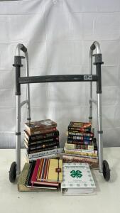 (1) Drive Folding Walker (14) Novels Including City Of Bones By Michael Connelly And 61 Hours By Lee Child (7) Cook Books Including Past, Present And Funture 4-H Family Favorites & More