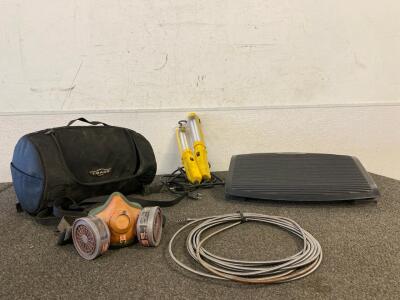 Scott Gas Mask, Behind The Seat Headrest Bag, Aidata Ergonomic Footrest, Drain Snake, And (2) Work Lights (Works)