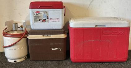 Small Propane Tank, (1) Small Gott Cooler, (1) Small Rubbermaid Cooler, & (1) Large Coleman Cooler