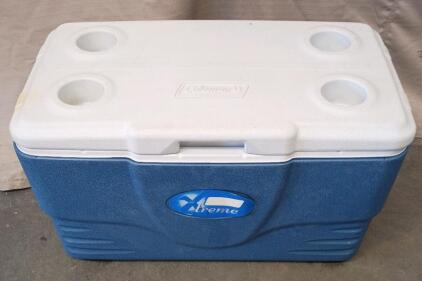 Coleman Xtreme Cooler. It is a Hard-Sided Cooler Designed to Keep Food and Drinks Cold for an Extended Period, Often Up to Several Days. 27"x15"x15"