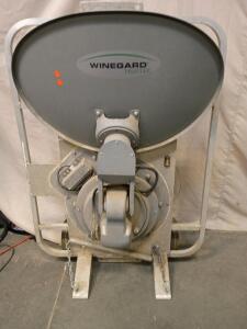 Winegard Trav'ler Satellite Television Antenna. This Type of Antenna is Designed for use in Recreational Vehicles (RVs) to Provide a Home-Like Viewing Experience While Traveling.