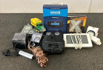 (1) Sirius Satellite Radio, (1) Ipod Charging Station, And More