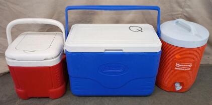 Round Orange Rubbermaid Cooler With Spout 15"x10"x10", Blue Coleman Cooler With Handle 14"x19"x10", Red Igloo Ice Cube Cooler 12"x12"x12"