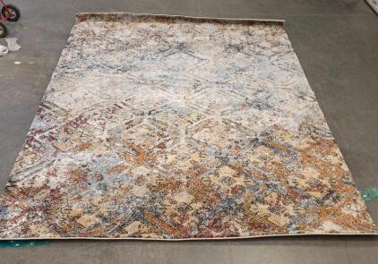This is a Livabliss Modern Abstract Area Rug With a New Carpet Pad Underneath The Rug. 130"x94"<br/>