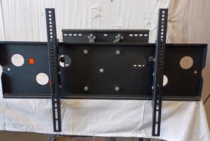 Full-Motion TV Wall Mount. This Type of Mount is Designed To Attach Up To A 82" TV's Allowing For a Wide Range of Adjustments.