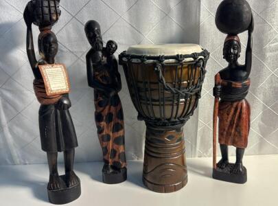 (1) Toca Origins Series Wood Rope-tuned Djembe with an African Mask design (3) 21&rdquo; Wood Carved African Folk Art Statues